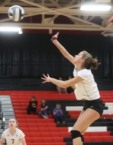 South RangeÕs Cracie Hiner (14) spikes the ball during the first set as Crestview High School takes on South Range High School during the 2017 DIII District Volleyball Tournament, Thursday, Oct. 19, 2017, at Salem High School in Salem. Crestwood won the series, 3-0...(Nikos Frazier | The Vindicator)..