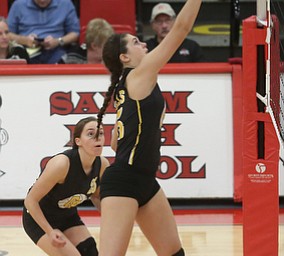 Crestview's MacKencie Daub (15) spikes the ball over the net during the second set as Crestview High School takes on South Range High School during the 2017 DIII District Volleyball Tournament, Thursday, Oct. 19, 2017, at Salem High School in Salem. Crestwood won the series, 3-0...(Nikos Frazier | The Vindicator)..