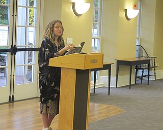 Neighbors | Zack Shively.Paige McKenzie, author of "The Haunting of Sunshine Girl" series and star of the YouTube series of the same name, read from one of her books during her visit to the Poland library during Teen Read Week.