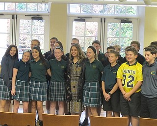 Neighbors | Zack Shively.Paige McKenzie spoke with students from Holy Family Schools. The seventh- and eighth-grade students heard about her life and how she created her YouTube and book series. The students also got a chance to ask her questions and take pictures with her.
