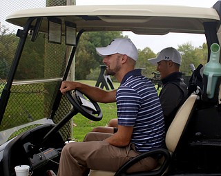 Jimmy Graham, a junior at Warren JFK, and golf coach Heath Myers talk on the driving range, Monday, Oct. 9, 2017, at the Avalon Golf and Country Club in Howland. ..(Nikos Frazier | The Vindicator)..