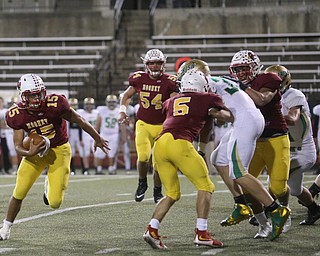 Cardinal Mooney quarterback Antonio Page (15) runs the ball during the first quarter as Ursuline High School takes on Cardinal Mooney High School, Friday, Oct. 20, 2017, at Stambaugh Stadium at Youngstown State University in Youngstown...(Nikos Frazier | The Vindicator)..
