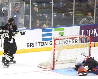 Muskegon Lumberjacks forward Nolan Sullivan (19) celebrates Muskegon Lumberjacks forward Egor Afanasyev (23)'s goal past Youngstown Phantoms goalie Wouter Peeters (36) during the second period as the Muskegon Lumberjacks take on the Youngstown Phantoms, Saturday, Oct. 21, 2017, at the Covelli Centre in Youngstown...(Nikos Frazier | The Vindicator)..