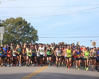And they're off..during the 42nd annual Youngstown Peace Race, Sunday, Oct. 22, 2017, in Youngstown...(Nikos Frazier | The Vindicator)