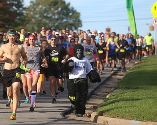 And they're off..during the 42nd annual Youngstown Peace Race, Sunday, Oct. 22, 2017, in Youngstown...(Nikos Frazier | The Vindicator)