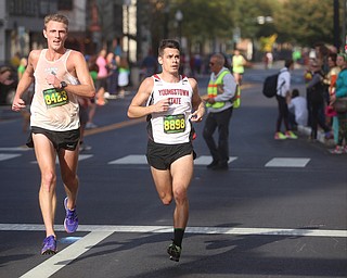 Craig Rupe of Penisula(8423) and Austin McLean(8898) complete the 42nd annual Youngstown Peace Race, Sunday, Oct. 22, 2017, in Youngstown. Rupe placed 11th overall with a time of 32:31 and McLean 12th with at time of 32:31...(Nikos Frazier | The Vindicator)