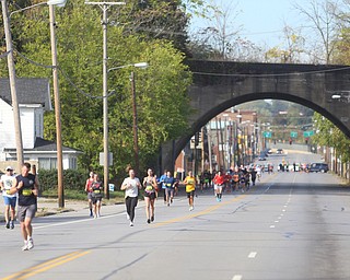 Runners run east on Mahoning Ave. towards downtown during the 42nd annual Youngstown Peace Race, Sunday, Oct. 22, 2017, in Youngstown...(Nikos Frazier | The Vindicator)