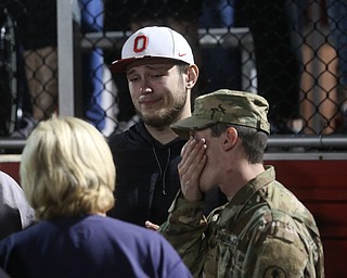 Arron Wayland, who witnessed the shooting, talks with Pat Leo's(back), mother of Girard Police Officer Justin Leo, Sunday, Oct. 22, 2017, at Arrowhead Stadium in Girard. Officer Leo was killed while responding to a potential suicide around 10:00 p.m., Saturday, Oct. 21, 2017, on the 400 block of Indiana Ave in Girard. Officer Leo was transported to St. ElizabethÕs Youngstown for surgery where he later died. ..(Nikos Frazier | The Vindicator)