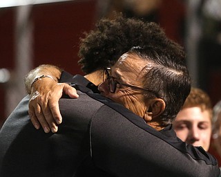 David Leo comforts Julian Berry, a member of the Girard Golf Team after vigil for his son, Girard Police Officer Justin Leo, Sunday, Oct. 22, 2017, at Arrowhead Stadium in Girard. Officer Leo was killed while responding to a potential suicide around 10:00 p.m., Saturday, Oct. 21, 2017, on the 400 block of Indiana Ave in Girard. Officer Leo was transported to St. ElizabethÕs Youngstown for surgery where he later died. ..(Nikos Frazier | The Vindicator)