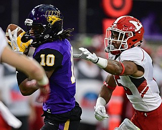 CEDAN FALLS, IOWA - OCTOBER 21, 2017: Northern Iowa's Daurice Fountain catches a pass in stride out of the reach of Youngstown State's Avery Larkin during the first half of their game Saturday afternoon at the UNI Dome. Northern Iowa won 19-14. DAVID DERMER | THE VINDICATOR
