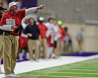 CEDAN FALLS, IOWA - OCTOBER 21, 2017: Youngstown State head coach Bo Pelini shouts instructions from the sideline during the first half of their game Saturday afternoon at the UNI Dome. Northern Iowa won 19-14. DAVID DERMER | THE VINDICATOR