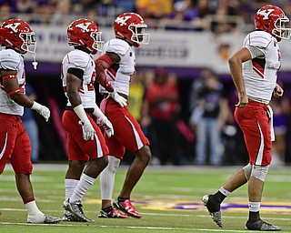 CEDAN FALLS, IOWA - OCTOBER 21, 2017: Youngstown State's Nathan Mays, right, hobbles off the field after sustaining an injury during the second half of their game Saturday afternoon at the UNI Dome. Northern Iowa won 19-14. DAVID DERMER | THE VINDICATOR