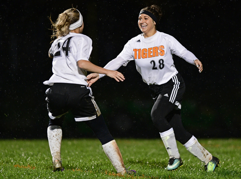 NEW SPRINGFIELD, OHIO - OCTOBER 23, 2017: Springfield's Shantel Springer, right, celebrates with Cierra Latronica after scoring a goal during the second half of their game Monday night at Springfield High School. Springfield won 5-1. DAVID DERMER | THE VINDICATOR