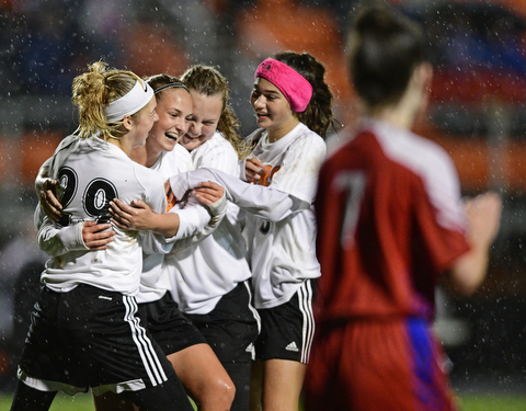 NEW SPRINGFIELD, OHIO - OCTOBER 23, 2017: Springfield's Kaylee Kosek, center, is congratulated by her teammates including Anna Rothwell, Jenna Hatton and Anna Ohlin after scoring a goal during the second half of their game Monday night at Springfield High School. Springfield won 5-1. DAVID DERMER | THE VINDICATOR..Lordstown's Mya Currence pictured.