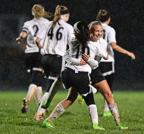 NEW SPRINGFIELD, OHIO - OCTOBER 23, 2017: Springfield's Kaylee Kosek is congratulated by Mya Duskey after scoring a goal during the second half of their game Monday night at Springfield High School. Springfield won 5-1. DAVID DERMER | THE VINDICATOR