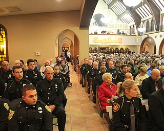 William D. Lewis The Vindicator Packed St Rose Chuirch in girard for vigil for slain officer. 10-24-17.