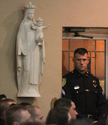 William D. Lewis The VindicatorPolice officers from many local depts attended a 10-24-17 prayer vigil for slain officer justin Leo at St Rose Church..