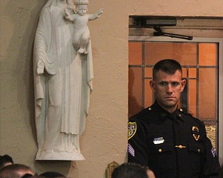 William D. Lewis The VindicatorPolice officers from many local depts attended a 10-24-17 prayer vigil for slain officer justin Leo at St Rose Church..