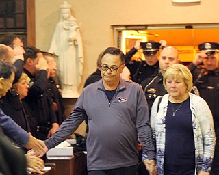 William D. Lewis The VindicatorDavid and Pat Leo, parents of slain Girard officer Justin Leo enter St Rose Church in Girard for a prayer vigil 10-24-17.