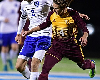 CORTLAND, OHIO - OCTOBER 23, 2017: Lakeview's Noah Busefink and South Range's Dakota Bartels battle while playing the ball during the second half of their game Tuesday night at Lakeview High School. Lakeview won 1-0. DAVID DERMER | THE VINDICATOR