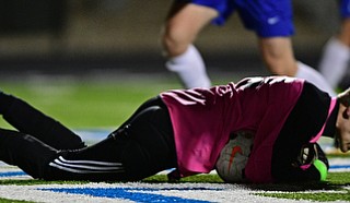 CORTLAND, OHIO - OCTOBER 23, 2017: Lakeview goalie Justin Grove dives on the ball for the save during the second half of their game Tuesday night at Lakeview High School. Lakeview won 1-0. DAVID DERMER | THE VINDICATOR