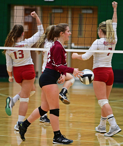BELOIT, OHIO - OCTOBER 24, 2017: Mooney's Maria Pelini, center, slams the ball in frustration while Crestwood's Mariah Kess, left, and Slate Bretz, right, celebrate winning the first set during their OHSAA Tournament match, Wednesday night at West Branch High School. DAVID DERMER | THE VINDICATOR