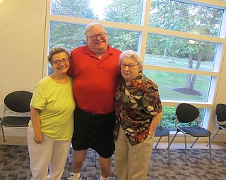 Neighbors | Zack Shively  .The Friends of the PLYMC Socrates Cafe Philosophy Group met in Austintown library on Sept. 11 to discuss philosophical thoughts. Topics ranged from environmentalism to addiction. Pictured are, from left, Assunta Delfre, Bill Zorn and Shirley Bartlett.
