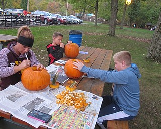 Neighbors | Zack Shively.Families participated in The Great Pumpkin Crave-Out Contest that ran from Oct. 13-15 at Boardman Park. The park placed the pumpkins on display in different age ranges.