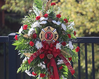     ROBERT K. YOSAY  | THE VINDICATOR..The Memorial Wreath at the Firefighters Memorial on  Federal St across from #1 station..Funeral Services for YFD  Battalion Chief Ron Russo were held Thursday at  Poland United Methodist Church ..The funeral procession then went from PUM to Fire Station  #1 and then to Green Haven  .Russo, 64, was a member of the city fire department for 37 years, working the rescue squad for the majority of his career...-30-