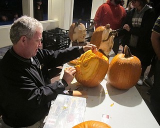 Neighbors | Zack Shively.Pumpkin artist Ron Roberts of Salem had a booth set up in the Kidston Pavilion at Fellows Riverside Gardens on Oct. 15. Roberts had a booth last year as well. He placed some pumpkins on display around him and some on the path near the booth.