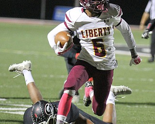 William D. Lewis The Vindicator Liberty's Quashion Campbell(6) scrambles for a  1rst qtr TD  10272017 in Girard.