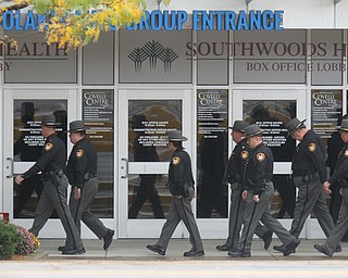 William D. Lewis The Vindicator  Police officers file into the Covelli Centre for slain police officer Justin Leo's calling hours 10-28-17.
