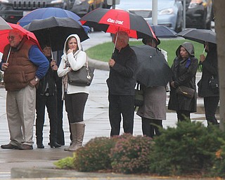 William D. Lewis The Vindicator   mourners  file into the Covelli Centre for slain police officer Justin Leo's calling hours 10-28-17.