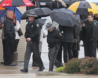 William D. Lewis The Vindicator  Police officers and mourners  file into the Covelli Centre for slain police officer Justin Leo's calling hours 10-28-17.