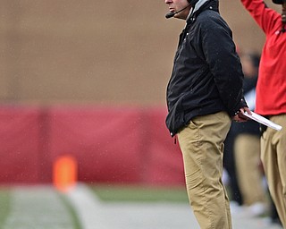 YOUNGSTOWN, OHIO - OCTOBER 28, 2017: Youngstown State head coach Bo Pelini stands on the sideline during the second half of their game, Saturday afternoon at Stambaugh Stadium. Illinois State won 35-0. DAVID DERMER | THE VINDICATOR