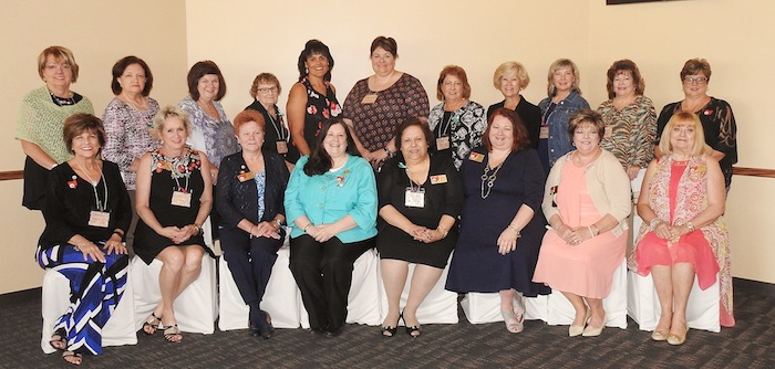 Austintown Junior Women’s League recently hosted the Northeast District Fall Conference at Hollywood Gaming at Mahoning Valley Race Course. Federation members met with GFWC state officers to share ideas on programs to benefit the citizens of Ohio. Recognition was given to individual clubs for volunteer efforts, and a brunch was served. More information on the AJWL can be found at www.facebook.com/AJWL2014. Above, members who attended the conference, seated from left, are Kathy Rusback, AJWL president; Yvonne Ford, GFWC Ohio secretary; Pam Vines, NED director of junior clubs; Lisa Hedrick, GFWC Ohio president; Mary Witkowski, NED president; Deidra Devore, GFWC Ohio director of junior clubs; Linda Crish, GFWC Ohio president-elect and Esther Gartland, GFWC Ohio director-elect of junior clubs. Standing, from left, are Marcia Denamen, Karma Minkewicz, Peggy Bennett, Shirley Schmidt, Ruty Rodriguez-Patterson, Dawn Blinsky, Sue Hovanec, Kathy Mock, Linda Jones, Marye Kay Erickson and Eileen Frost.