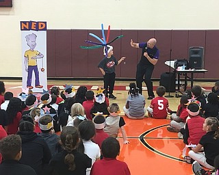 The NED Show is a character education program that centers around three important messages: Never give up, Encourage others and Do your best. Chad Adams and his cartoon character friend, NED, taught the kindergarten through third-grade students at Campbell Elementary/Middle School how to become a “champion” at school and in life. Students learned about the importance of those three life skills while using storytelling, magic, humor and yo-yo tricks. Pictured, above, are Chad Adams and a student, Bryce Dingus, wearing a fancy balloon hat and holding a new NED yo-yo for his participation in the program. Below, first-grade class wears their “I am a Champion” crowns during the assembly. Students will have the opportunity to purchase the NED Show yo-yos as part of the Pay-It-Forward program. All yo-yos purchased will further the NED program to be shared in other schools.
