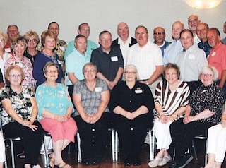 Chaney High School Class of 1965 members celebrated their 70th birthdays at a reunion in July at St. Christine Parish Center in Youngstown. Classmates in attendance, pictured above, seated, from left, are Nancy Burns Graff, Marsha Lewis Caron, Lydia McCartney Hammar, Elaine Bada Donchess, Carol Toporcer Thompson, Regina Semko, Rita Thomas, Patty Lorenzi Porter, Mary Anne McManus Carkido and Margaret Kalosky McCormick. Second row, from left, are Peggy Panko Machingo, Ruth Damore Zemko, Michele Young Helbig, Kathy Donatiello Weingart, Sharon Senzik Weiss, Sue Stevens, Tom Sharfal, Bob Cruickshank, Tony Pappagallo, Art Mascola, Larry Gillespie, Betty Ann Dixon Potts, Mary Ann Kalosky Kolosi, Phyllis Tocco Patterson and Ray Briya. Back row, from left, are George Remias, Alice Fabinak Morrow, Barb Santoio Holan, Bob Whitaker, Pam Grant Gbur, Earl Runcan, Linda Rinehart Sine, Ron DiRenzo, Dan Schnell, John Davis, George Kalosky, Earl Whetstone, Richard Bartholomy, an unidentified attendee, Mike Pilak, Bill Kolosi, Joe Carkido, Bernard Jackson, Dave Fero, Gerald Lodi and Jerry Makowka. Below, from left, seated, are Jeannette Thomas Geisler, Lois Cardelein Nyers, Sue Ann Carfolo Niro, Charlotte Tesner Rocca, Janis Crosbie Ugran, Laura Borton Capezio, Barb Regal, Barb Bacho Valinksy, Tony Capezio, Rosemary Cabuno Cuccia, Carrie Lengyel Randall, Bev McPherson Galla and Nancy Holmgren Hickman. Back row, from left, are Janis Knable Yovich, Mary Rutledge Karp, Joan Toth Frank, Kathy Balint Chambers, Geri Terlecky Kaster, Mike Pallo, Nancy Braidich Pallo, Steve James, Shirley Beaman James, Dan Kollay, Ted Pysher, Joe Steller, Kathy Koroczynsky Battisti, Nancy Gromada Linonis, Fred Sargent, Rosemarie Fabrizio Leapaldt, Bev Goncy, Paul Milligan, Linda Bartell Giersher, Luba Hrycak Horsky, Mike Nyers, Joe Tahos and Ken Shaffer.
