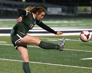 Elyria Catholic defender Abby Birsic (15) kicks the ball during the first half as Elyria Catholic High School takes on Springfield Local High School in the Division III Region 9 Regional Semi-Finals, Tuesday, Oct. 31, 2017, at Green Memorial Stadium in Uniontown. Elyria won 6-0...(Nikos Frazier | The Vindicator)..