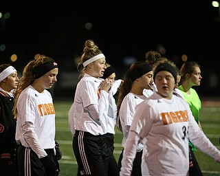 The Springfield Local girls soccer team walks off the field after loosing to Elyria Catholic High School, 0-6 in the Division III Region 9 Regional Semi-Finals, Tuesday, Oct. 31, 2017, at Green Memorial Stadium in Uniontown...(Nikos Frazier | The Vindicator)..
