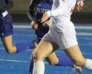 William D. Lewis the vindicator Canfield's Hannah Stein(25) kicks the ball around Revere'sTaylor Kenna during 10312017 action in Ravenna.
