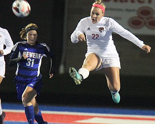 William D. Lewis the Vindicator Canfield's Chole Kalina(22) kicks the ball past Revere's ASydney Padgett(31) during 10312017 action at Ravenna.
