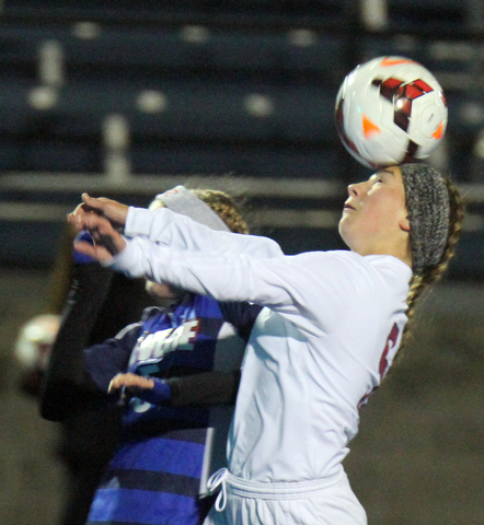 William D. Lewis the Vindicator  Canfield's Marisa Scheetz(5) heads the ball during 10312017 action at Ravenna.