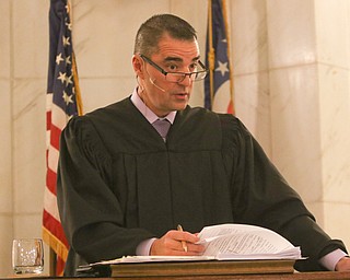 ROBERT K. YOSAY | THE VINDICATOR..Judge Robert N Rusu Jr..A young girl found a new home as Judge Robert N. Rusu of Mahoning County Probate Court presided over her adoption in the courthouse rotunda during the countyÕs fourth Adoption Day celebrationÓ ...-30-