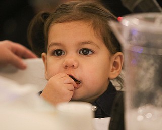 ROBERT K. YOSAY | THE VINDICATOR..Jacqueline Rose Wolfe - adoptee listens to Judge Robert Rusu ..A young girl found a new home as Judge Robert N. Rusu of Mahoning County Probate Court presided over her adoption in the courthouse rotunda during the countyÕs fourth Adoption Day celebrationÓ ...-30-
