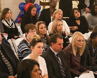     ROBERT K. YOSAY  | THE VINDICATOR..A young girl found a new home as Judge Robert N. Rusu of Mahoning County Probate Court presided over her adoption in the courthouse rotunda during the countyÕs fourth Adoption Day celebrationÓ ...-30-