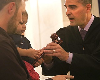 ROBERT K. YOSAY | THE VINDICATOR..Judge Robert N Rusu Jr Jacqueline Rose Wolfe and her dad Shawn..A young girl found a new home as Judge Robert N. Rusu of Mahoning County Probate Court presided over her adoption in the courthouse rotunda during the countyÕs fourth Adoption Day celebrationÓ ...-30-
