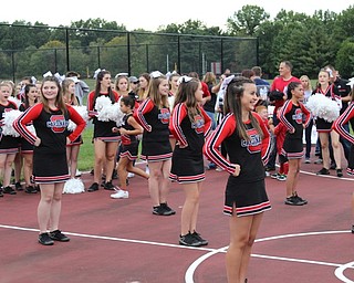 Neighbors | Abby Slanker.Canfield High School freshman cheerleaders led a cheer at the Canfield Community Tailgate on Sept. 15.