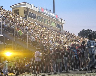 Neighbors | Zack Shively.Spartan fans filled the seats for their rival game against Mooney after the pep rally and parade. Superintendent Timothy Saxton expected to set record numbers in the two-year-old stadium.
