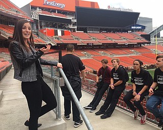 Neighbors | Submitted .Pictured is Briana Harris showing BSTN students Matthew Welton, Alex LaBerto, Ethan Ngo and Charles Queen around FirstEnergy Stadium.